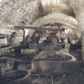 Abandoned brewery basement with a Pelton Water Wheel.